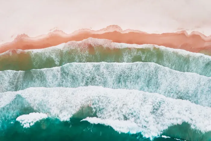 Framed Print : Layered Pattern of waves on beach