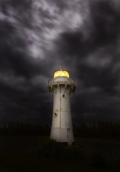 lighthouse with stormy clouds