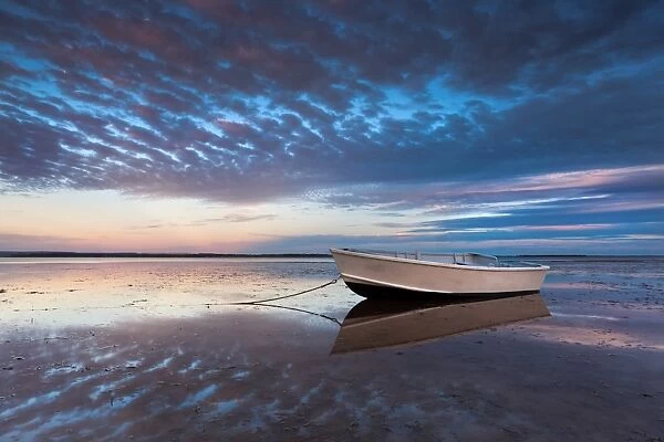Lone boat at dusk