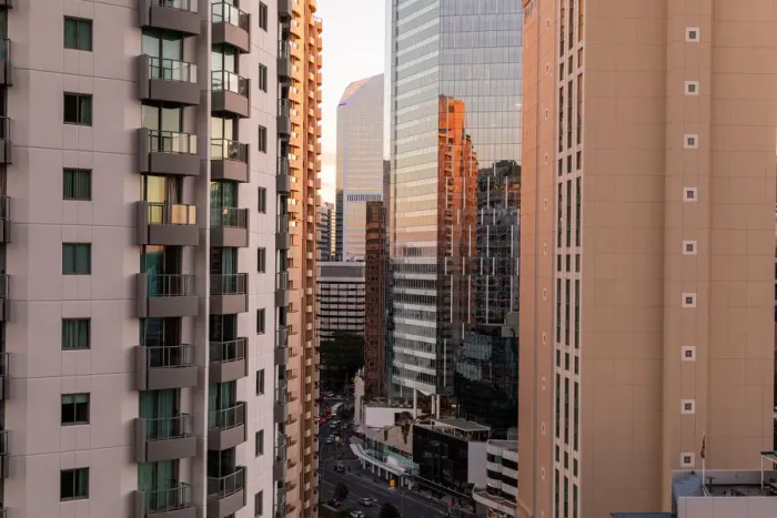 Framed Print : looking through tall buildings at sunset in Brisbane down onto the road Framed Print : looking through tall buildings at sunset in Brisbane down onto the road