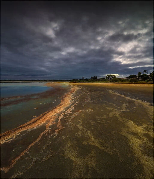 Low tide during stormy weather at a Salt lagoon near Indented head, Bellarine Peninsula