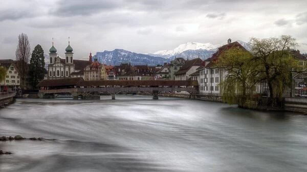 Lucerne old town Jesuit Church and wooden bridge