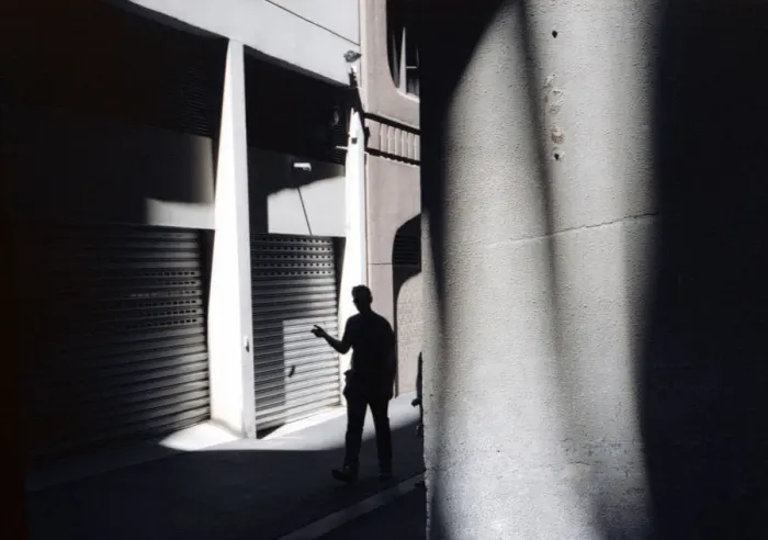 Framed Print : Man in alley