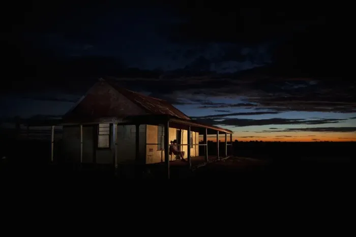 Framed Print : man in front of outback shed