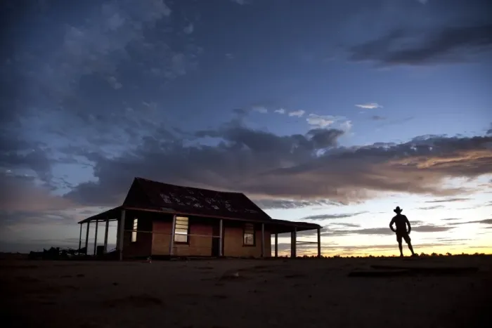 Framed Print : man in front of outback shed Framed Print : man in front of outback shed