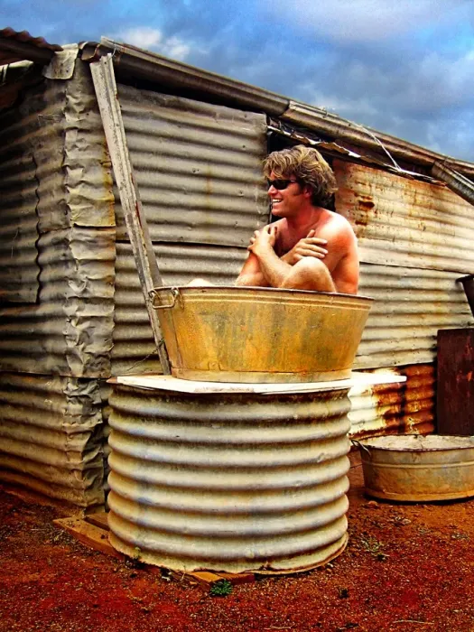 Framed Print : Man Sitting in a Bath Tub Framed Print : Man Sitting in a Bath Tub