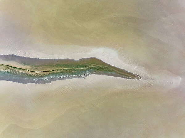 Minimal drone image showing a stream of water on a flood plain, Wyndham, Western Australia, Australia