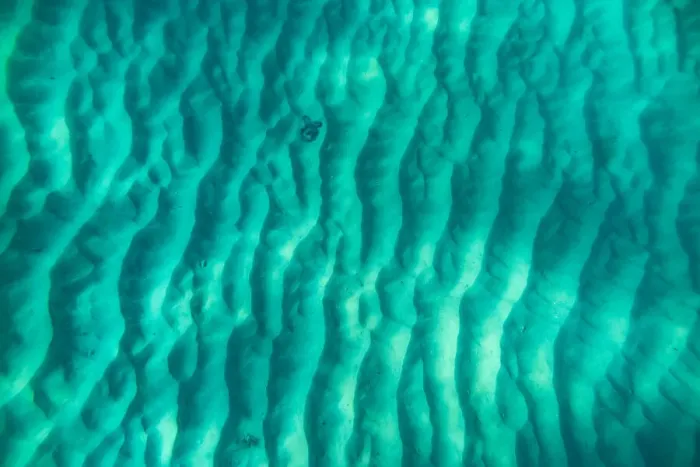 Framed Print : Moreton Island - an underwater shot of ripples in the white sand