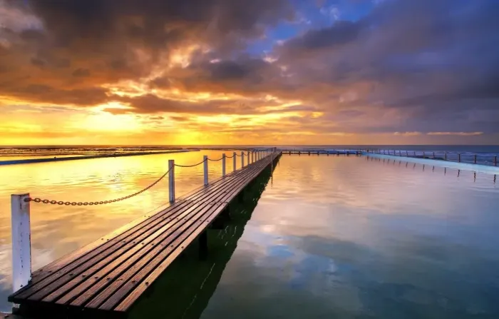 Framed Print : Morning Sun Reflecting on Seaside Pool