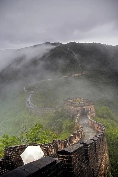 Mutianyu Great Wall of China covered in fog