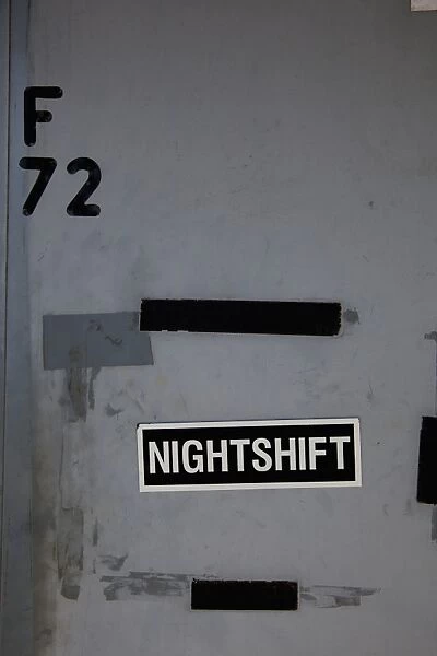 NIGHTSHIFT sign on a wall