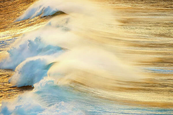 ocean shot with breaking waves and early morning light