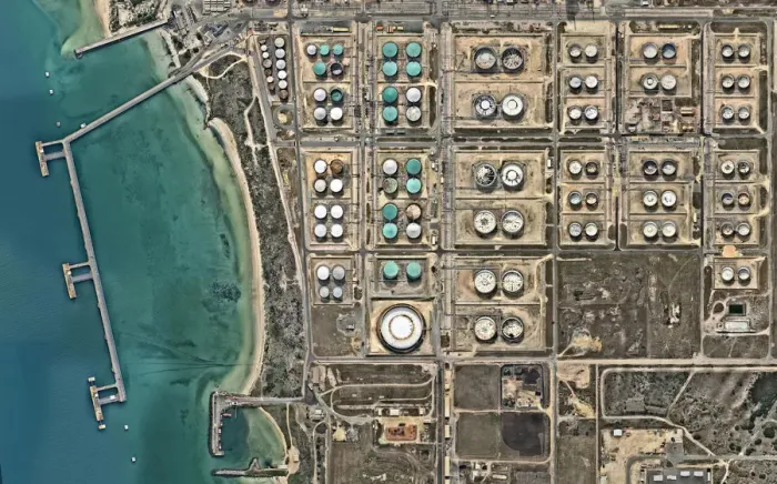 Framed Print : Oil reservoirs at industrial refinery