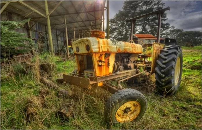 Framed Print : Old and abandoned tractor rusting away on King Island, Bass Strait, Tasmania, Australia