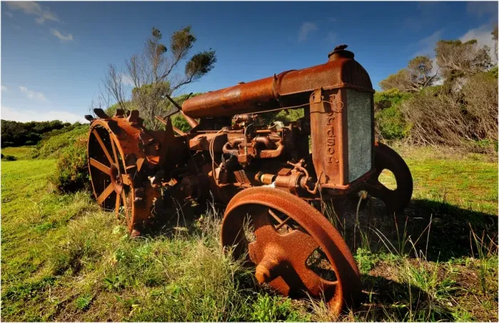 Framed Print : Old and abandoned tractor rusting away on King Island, Bass Strait, Tasmania, Australia