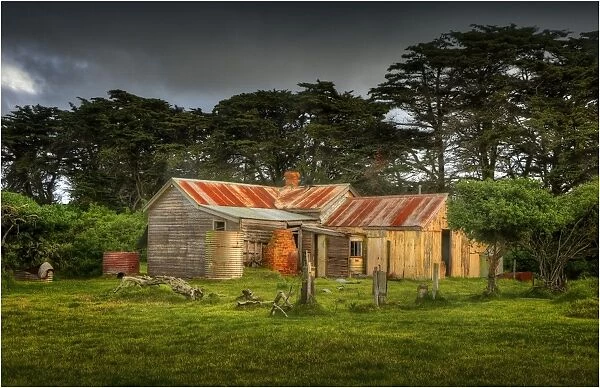 Old and derelict, abandoned farmhouse in the countryside of King Island, Tasmania