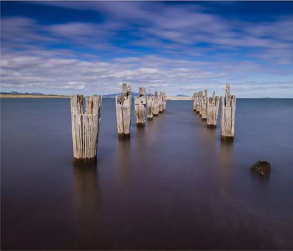 Old derelict pier at Lillies beach, on the coastline of Sawyers bay, Flinders Island, Bass Strait, Tasmania, Australia