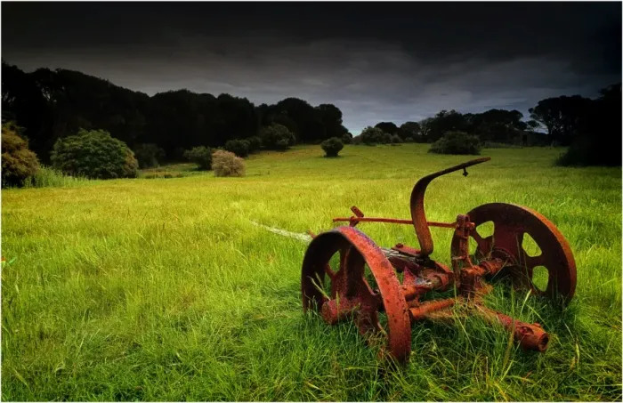 Framed Print : Old farm machinery lays rusting away in a farm paddock near Wybalenna, Flinders Island Tasmania Framed Print : Old farm machinery lays rusting away in a farm paddock near Wybalenna, Flinders Island Tasmania