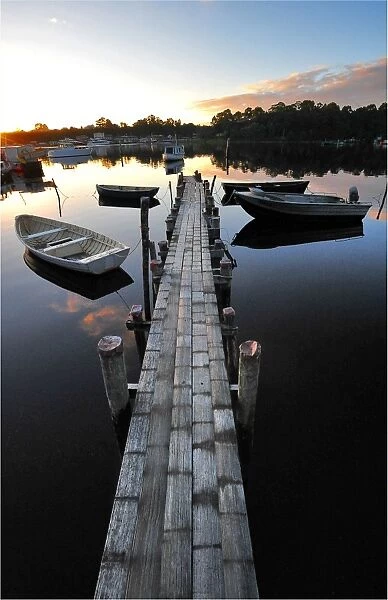 Old pier at Strahan, in the south west of the island state, Tasmania, Australia