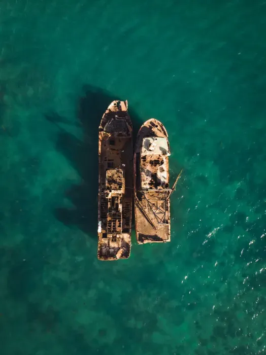 Framed Print : Overhead shot of two shipwrecks in Port Moresby Framed Print : Overhead shot of two shipwrecks in Port Moresby