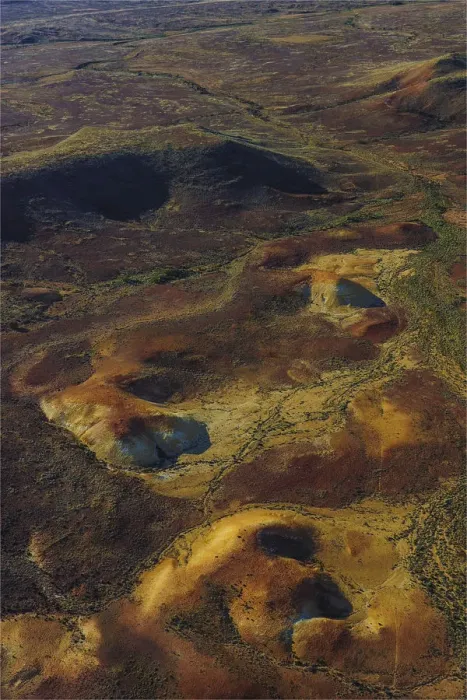 Framed Print : The Painted hills, an area of outstanding natural beauty in the arid region of Anna Creek, outback South Australia