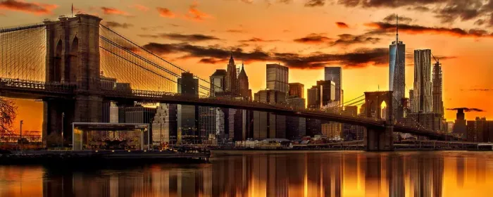 Framed Print : A panorama view of a fiery sunset over the Manhattan skyline