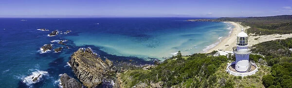 Panoramic aerial view of Sugarloaf Point Lighthouse overlooking Lighthouse Beach