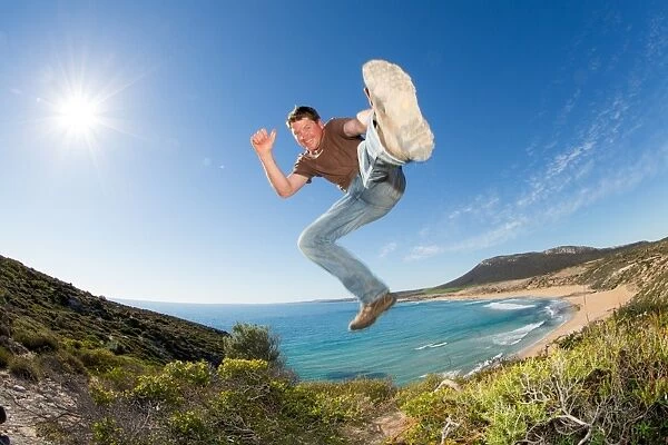 Photographer Robert Lang jumping in the air