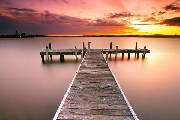 Pier in Lake Macquarie at sunset, Australia