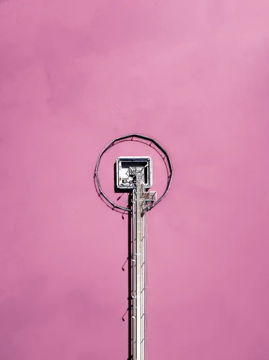 Framed Print : Pier in a pink coloured salt lake shot from a drone point of view Framed Print : Pier in a pink coloured salt lake shot from a drone point of view