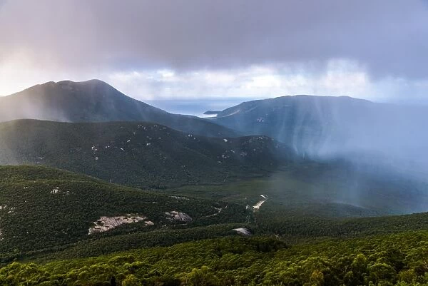 Rain cloud passing by at the top of Mount Oberon at Wilsons Promontory, Victoria