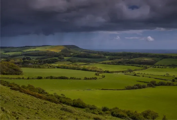 Framed Print : Rain over the Purbeck hills Framed Print : Rain over the Purbeck hills