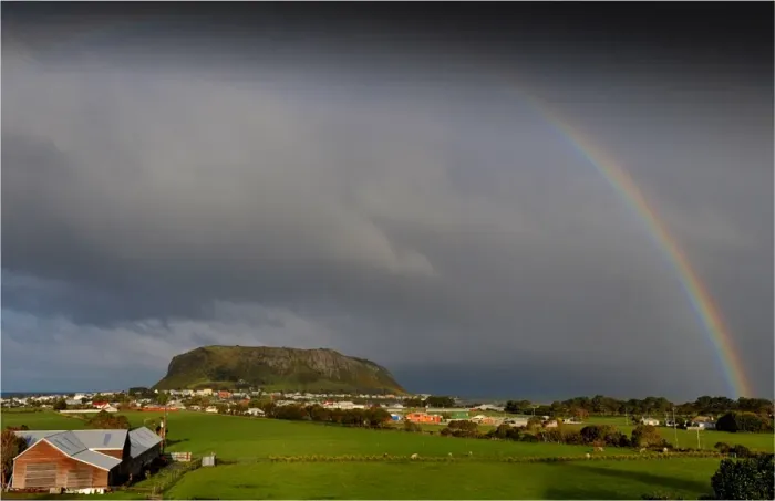 Framed Print : Rainbow appearing over Circular head at Stanley, in the northern area of the island state, Tasmania, Australia