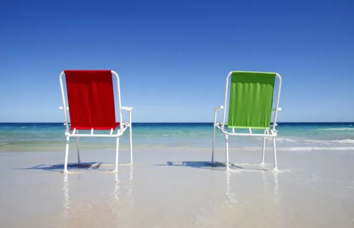 Framed Print : Red and green beach chairs