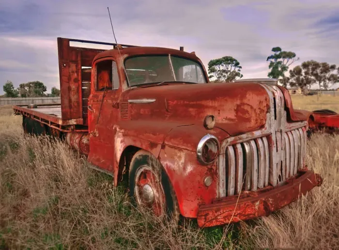 Framed Print : Red and rusted truck