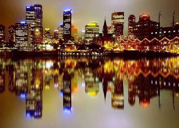 Reflection of Sydney skyline in water, Australia
