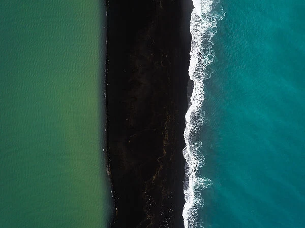 River, black beach and ocean, Iceland