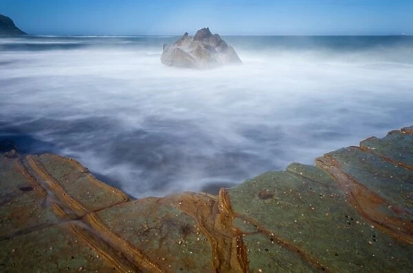 Rock patterns and swirling water