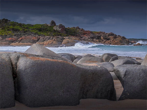 Rocky outcrops and a beautiful stretch of sand called Broken Arm beach, near Grassy, King Island, Bass Straight, Tasmania