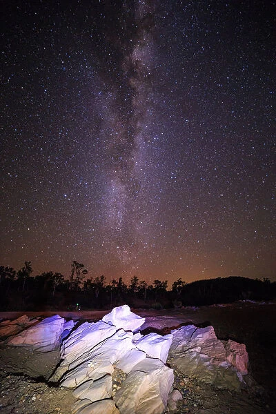 Rocky Way. The milky way soaring above a river bed in northern Australia