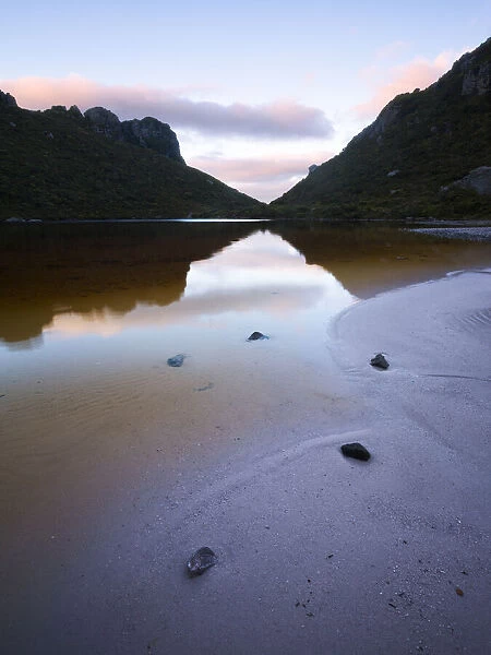 The sandy shores of Lake Cygnus, Southwest National Park, Tasmania, Australia