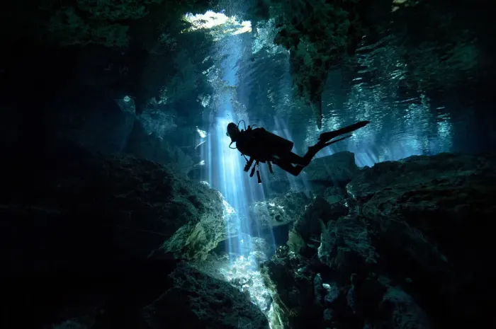 Framed Print : Scuba diver inside cenote in Mexico