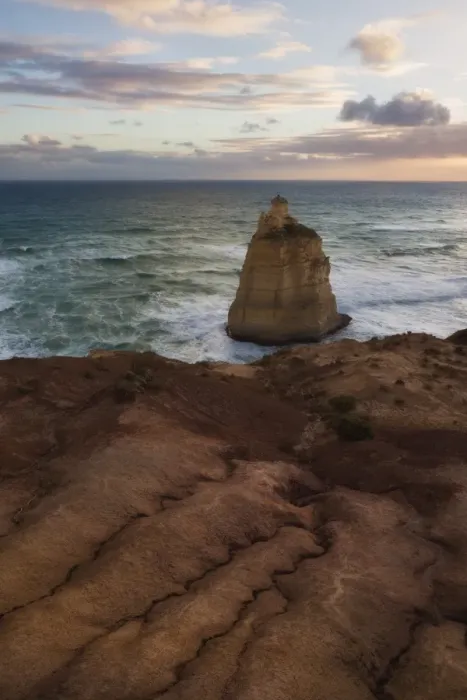 Framed Print : A sea stack below an eroding cliff edge at sunset, Great Ocean Road, Victoria, Australia