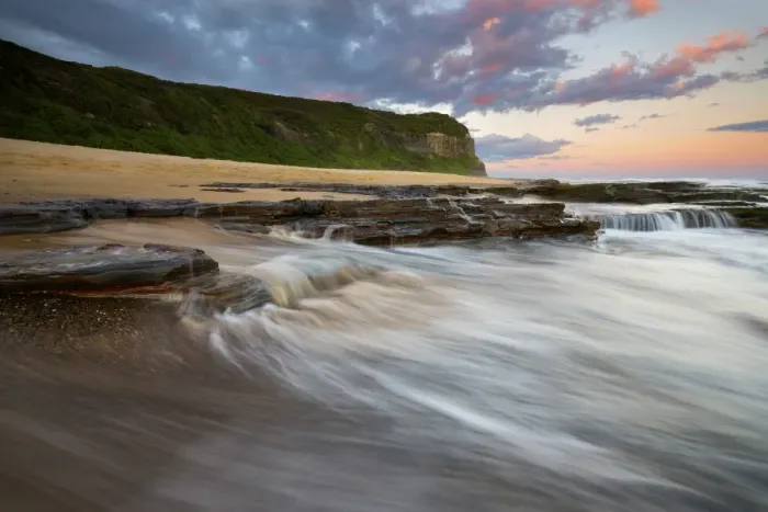 Framed Print : seascape with cliff in the background