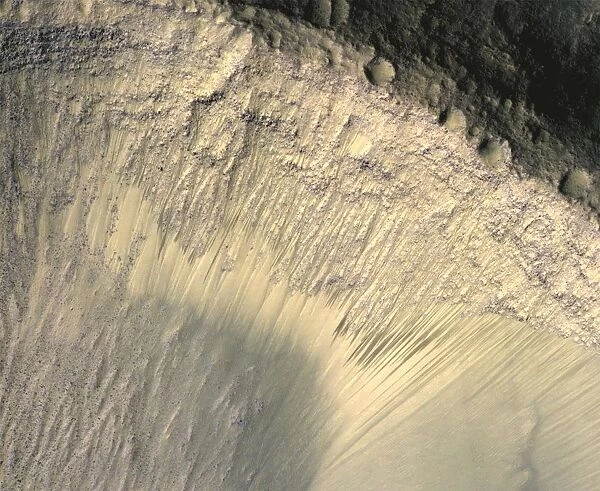 Seasonal Changes in Dark Marks on an Equatorial Martian Slope