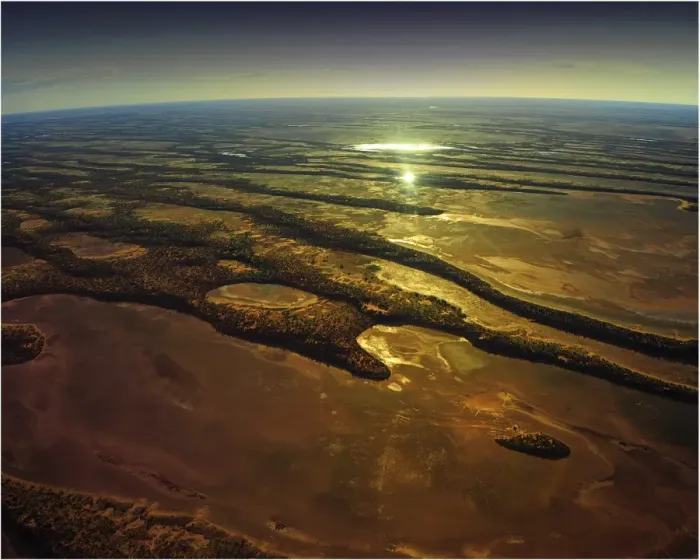 Framed Print : The setting sun in outback South Australia from the air