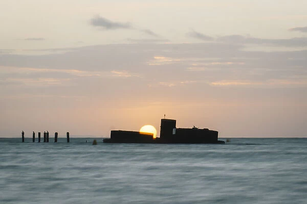 Shipwreck silhouette at sunset, Half Moon Bay, Melbourne