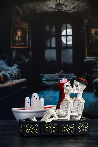 Skeleton couple in haunted room