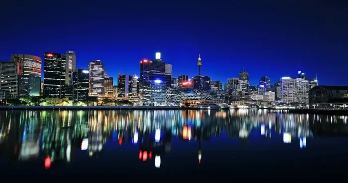 Framed Print : Skyline. View of Sydney skyline reflecting in water at night, Australia