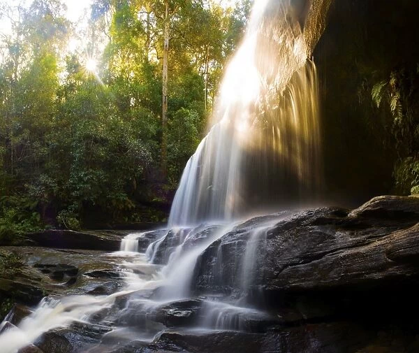 Somersby falls with sun star